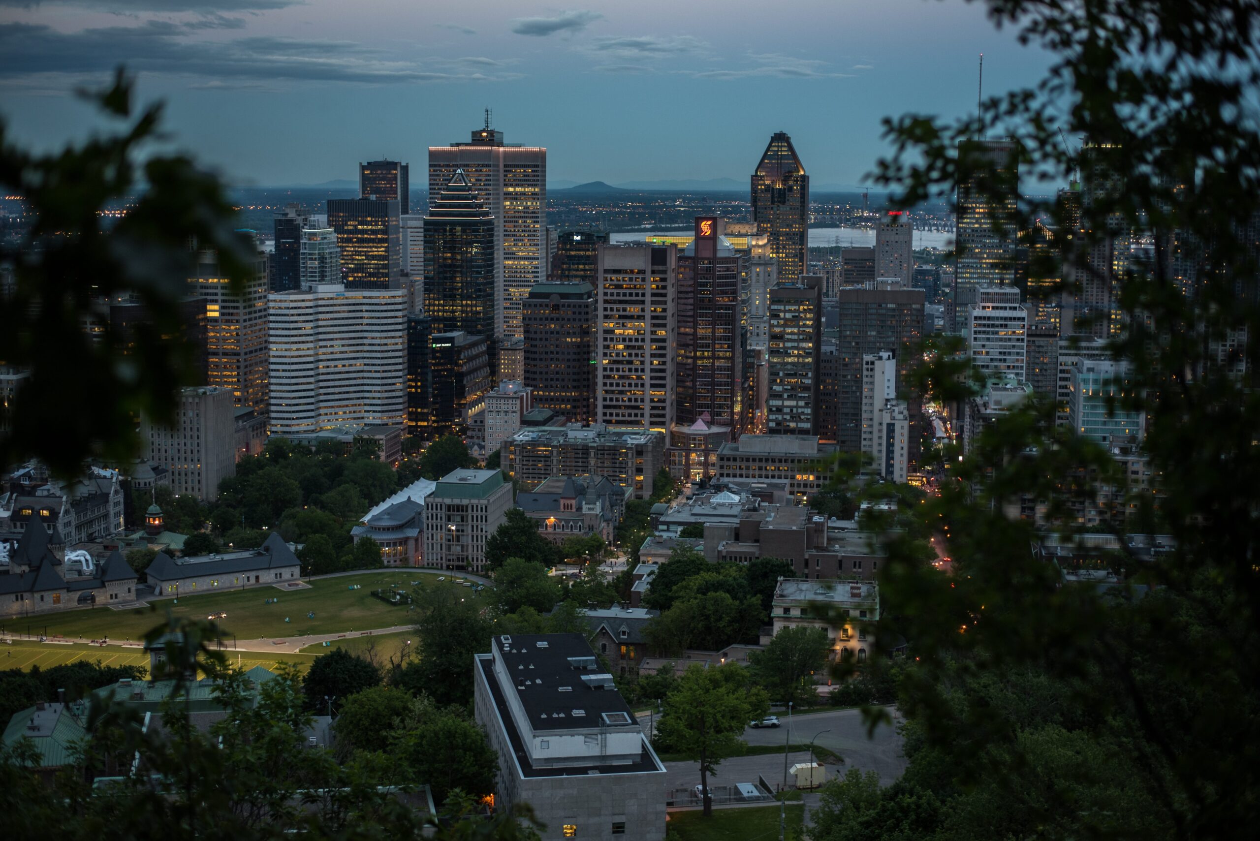 Standing on Mount Royal, overlooking the streets and skyscrapers of downtown of Montreal